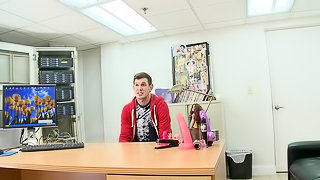 A guy jerks off in an office and gets butt fucked