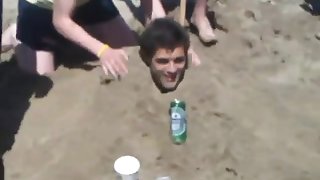 Lads piss hzaing a partner at seaside