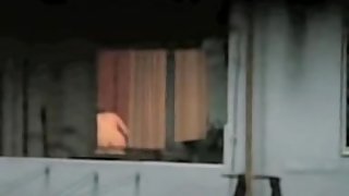 Horny neighbor nude and voyeured through window