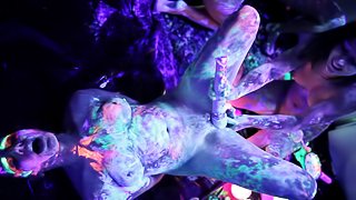 Black light lesbian orgy party with sexy body paint