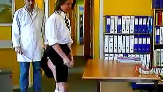 Schoolgirl bends over for a caning