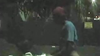 Black guy fucks a white girl in the park and gets a visit from the park guard
