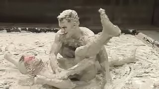 Dean Tucker and James Hamilton fight in clay and make fervent gay love