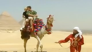 Two sexy girls having hardcore sex with guy in Egyptian desert