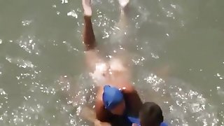 Voyeur busts nudists in the sea. that blowjob tasted salty for sure !!!