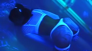 Black light body paint play with a babe in white lingerie